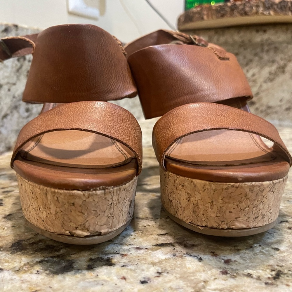 Tan women’s wedge with cork style heel